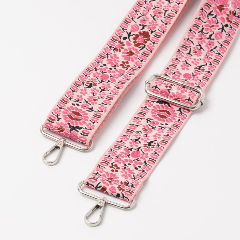 Skulderrem med rosa blomster